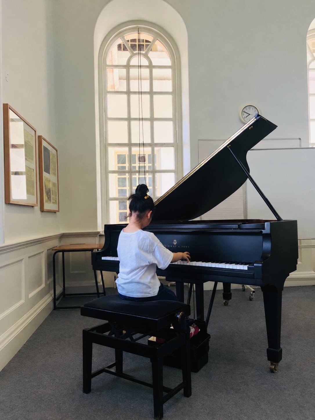 A young musician at the piano